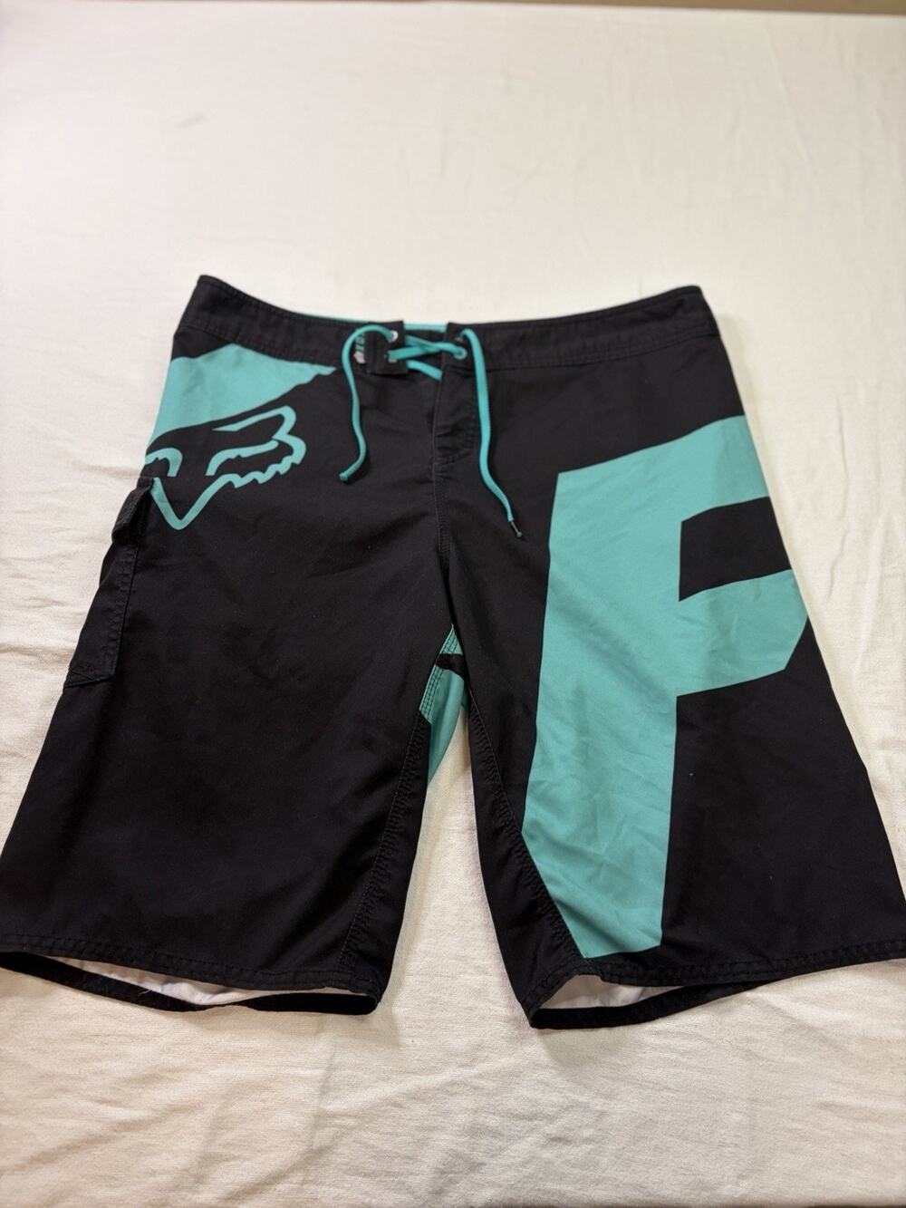 Fox Racing Board Shorts Men’s 34 Black Teal Surf Swim Trunks Logo Cargo Pocket